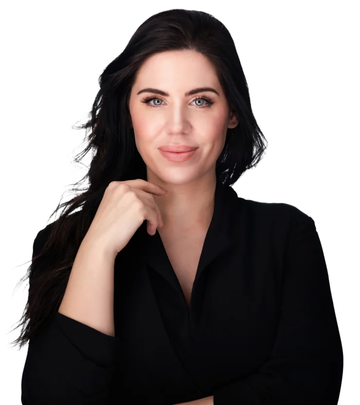 Kara Stephens resting her chin on her hand, wearing a black blouse.