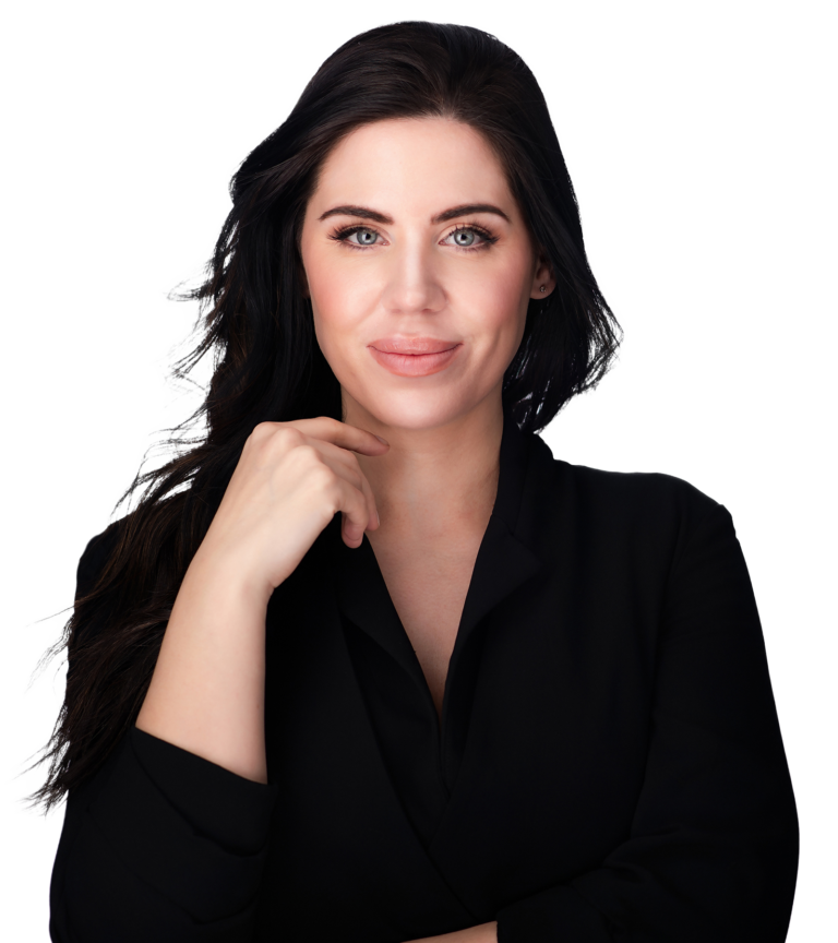 Kara Stephens resting her chin on her hand, wearing a black blouse.